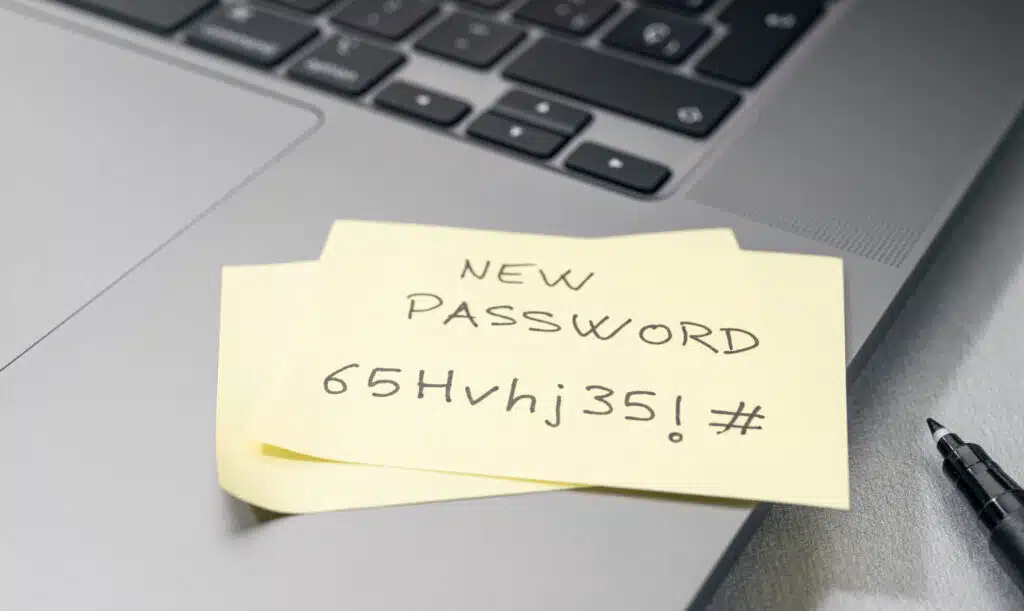 New, strong password on sticky note